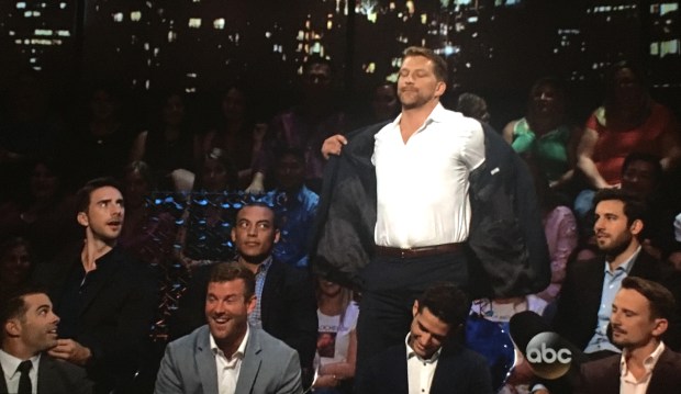 nick takes jacket off men tell all