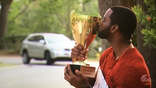 josiash kissing trophy.JPG
